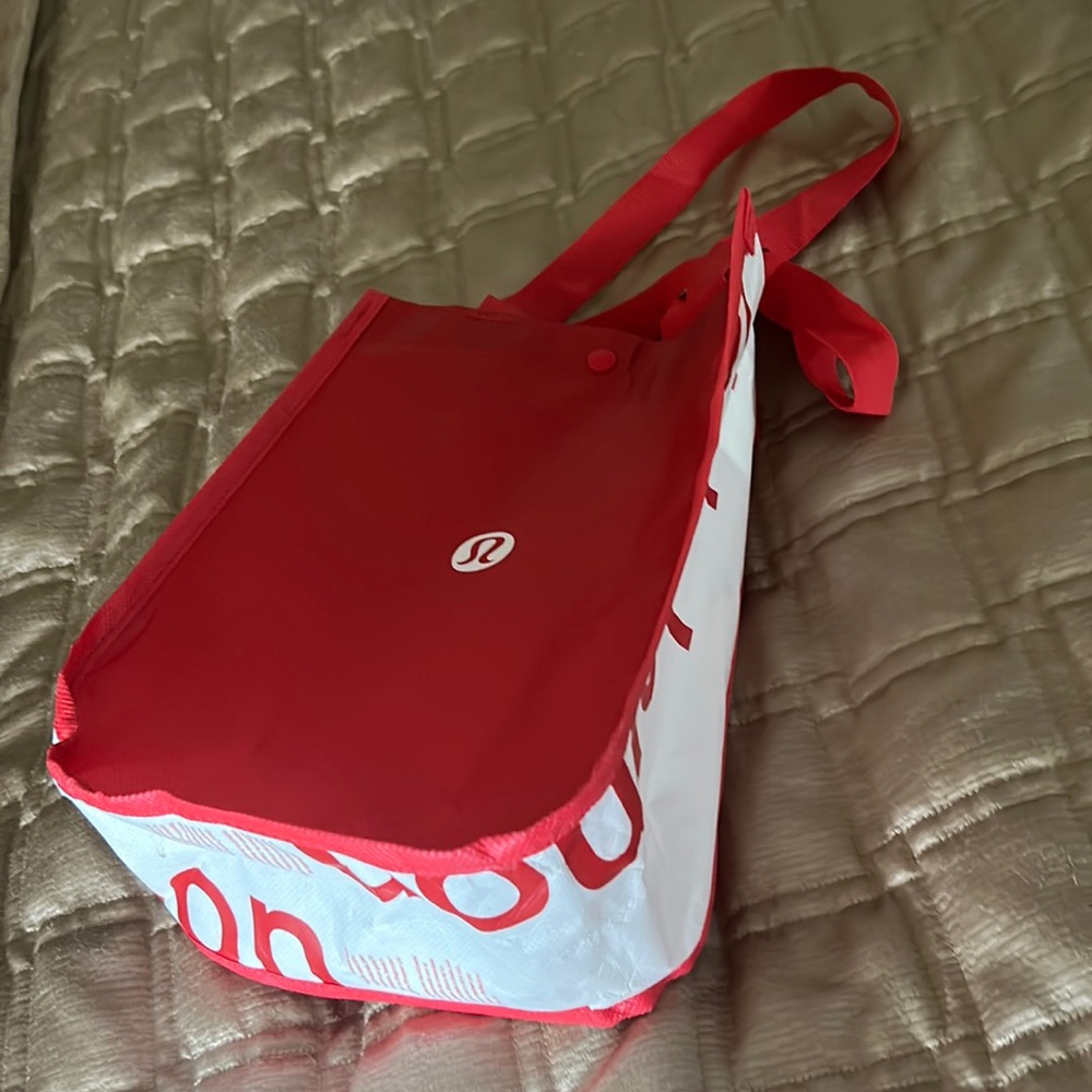 Red and white Lululemon bag
